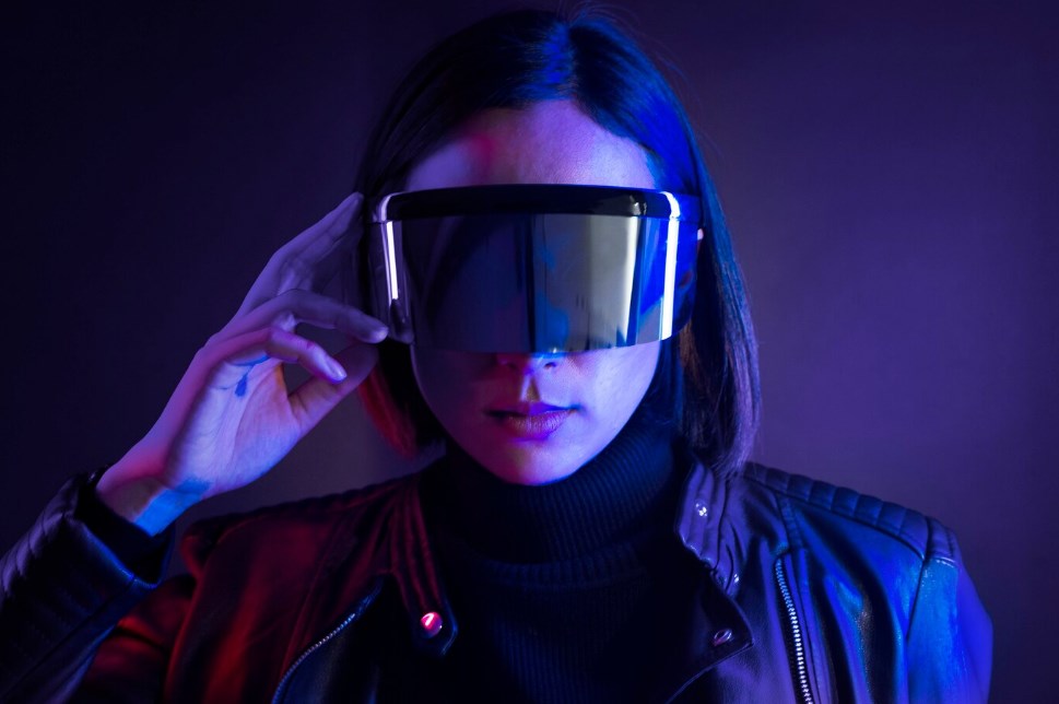 futuristic technology concept: a woman wearing smart glasses