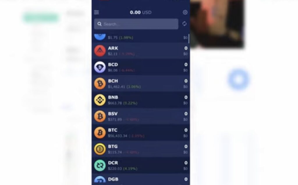 A blurred screenshot of a cryptocurrency app interface, displaying a list of digital currencies with their prices and percentage changes