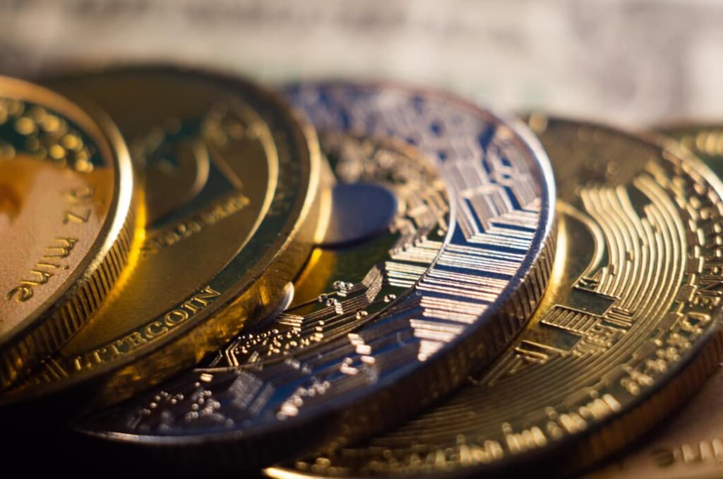 Closeup shot of a pile of cryptocurrency cash golden coins